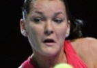 Radwanska salva 3 match-points contra Zvonareva e fica na briga - Bulent Kilic/AFP