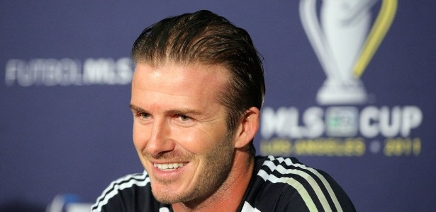 Beckham durante entrevista coletiva após o Galaxy conquistar o título nacional em 2011 - Victor Decolongon/Getty Images/AFP