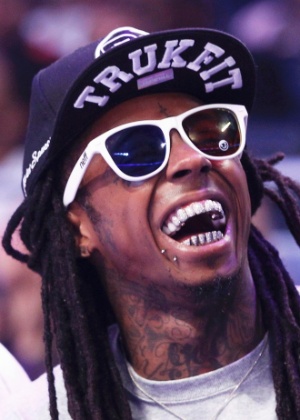 O rapper Lil" Wayne esteve entre os fãs ilustres da partida - Jeff Haynes/Reuters