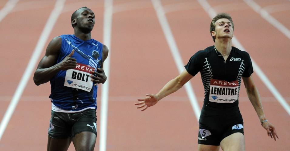 Usain Bolt (esquerda) venceu prova dos 200m na Liga de Diamante, seguido de C. Lemaitre (08/07/2011)