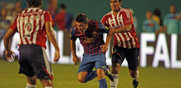 David Villa marcou para o Barcelona, mas time espanhol acabou goleado pelo Chivas - AFP PHOTO / ALEXIA FODERE