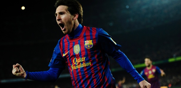 Messi comemora após marcar gol contra o Valencia - Manu Fernandez/AP
