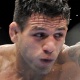 Rafael dos Anjos acerta Rob Emerson no UFC 103 (02/06/2011) - Jon Kopaloff/Getty Images