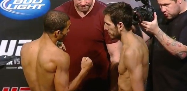 José Aldo (e) e Kenny Florian se encaram na pesagem do UFC 136, em Houston - Reprodução