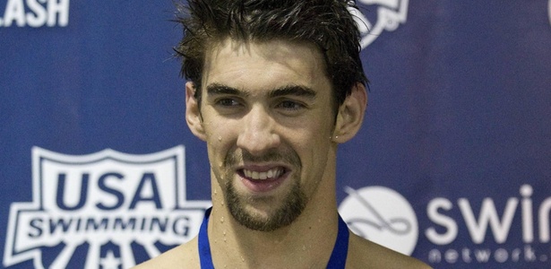 Michael Phelps sorri ao conquistar ouro dos 100 m borboleta em prova em Charlotte, nos EUA (15/05/2009)