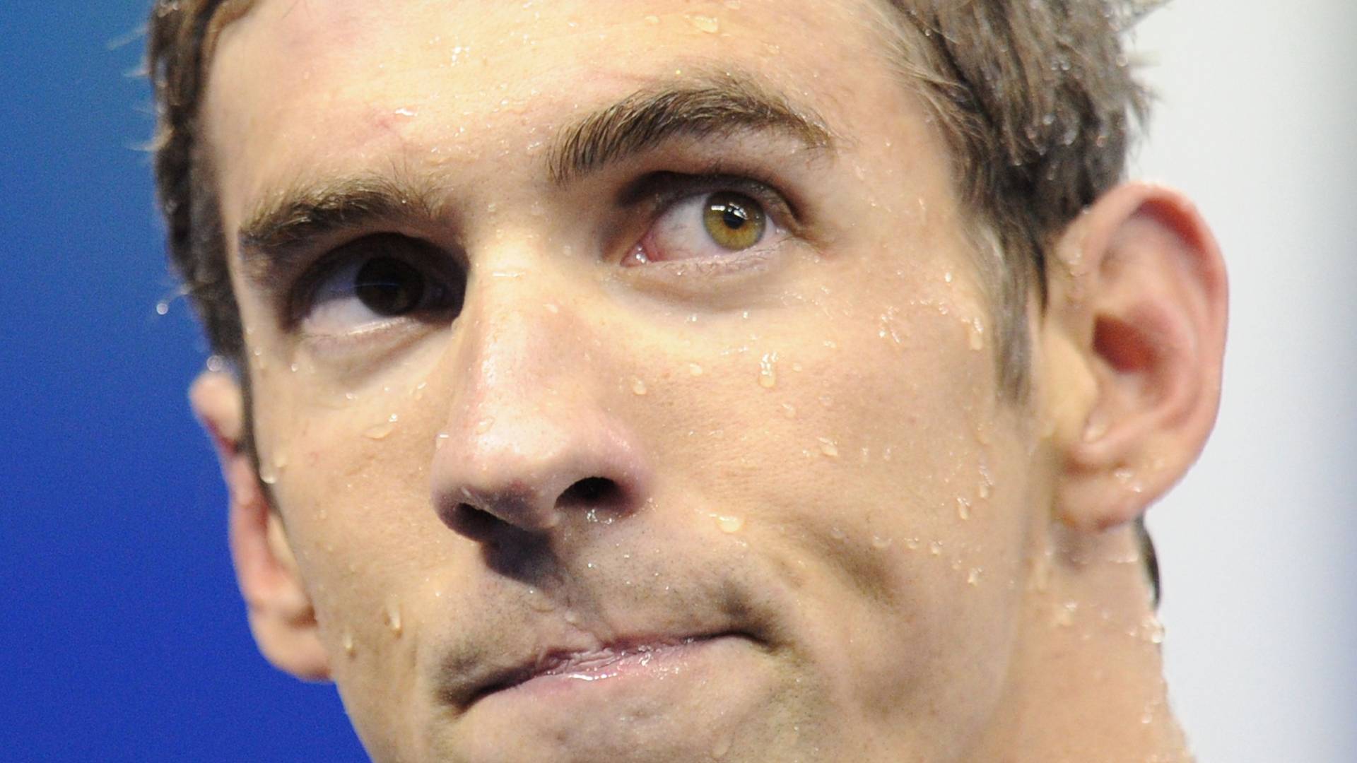 Michael Phelps reage após conquista do ouro nos 100 m borboleta no Mundial de Xangai