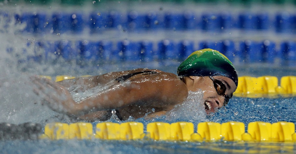 Daynara de Paula bateu na primeira colocação nas eliminatórias dos 100m borboleta, com 1min01s39, segundo o placar do ginásio no México (15/10/2011) 