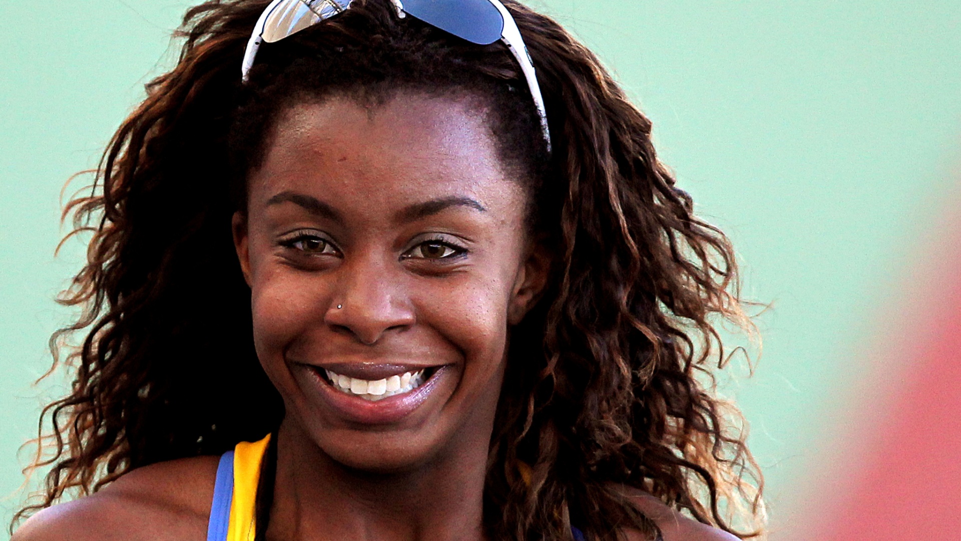 Rosangela Santos sorri após conquistar o ouro nos 100 m rasos em Guadalajara (25/10/2011)