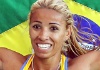 Lucimara Silvestre comemora com a bandeira brasileira seu ouro no heptatlo (26/10/2011) - Flavio Florido/UOL