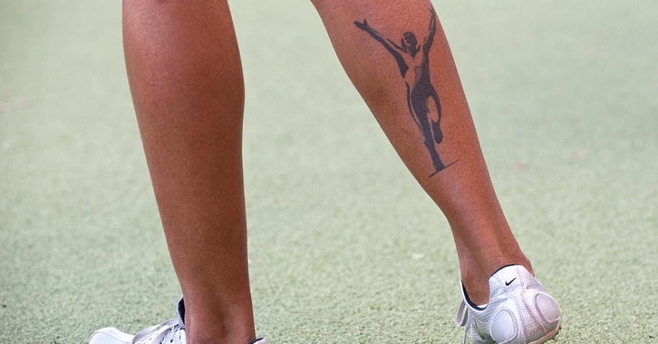 Detalhe de tatuagem de Jailma Lima, brasileira que competiu no revezamento 4x400 m e ficou com a prata (28/10/2011)