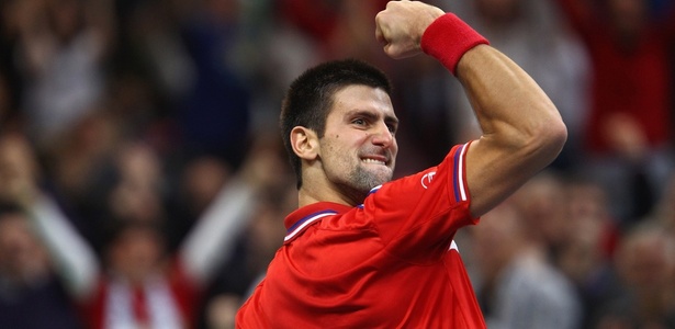 Novak Djokovic comemora ponto na vitória contra Gael Monfils na final da Davis - Julian Finney/Getty Images