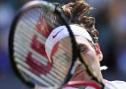 Federer sua, mas confirma favoritismo e supera cazaque em Wimbledon - AFP