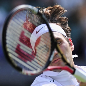 Federer teve trabalho para superar Kukushkin nos dois primeiros sets, mas estreou com vitória - AFP