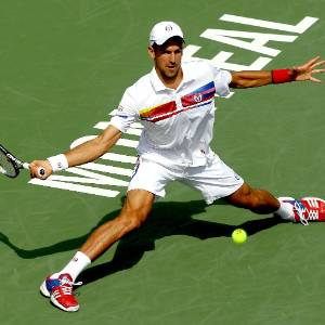 Novak Djokovic rebate bola na vitória contra o croata Marin Cilic, no Masters 1000 de Montréal  - Matthew Stockman/Getty Images/AFP 