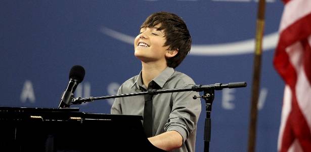 Greyson Chance, de 14 anos, rouba a cena em cerimônia de abertura do Aberto dos EUA - Nick Laham/Getty Images/AFP