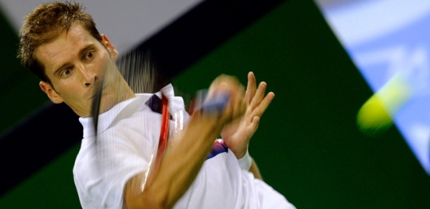 Com estilo agressivo, Mayer sacou bem e superou Nadal em torneio na China - Goh Chai Hin/AFP