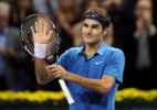 Federer justifica ausência em turnê asiática por conta de lesões e divulga calendário para 2012 - AFP PHOTO / FABRICE COFFRINI