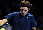 Roger Federer abre 1ª fase do ATP Finals com vitória apertada sobre Tsonga - AFP PHOTO / LEON NEAL