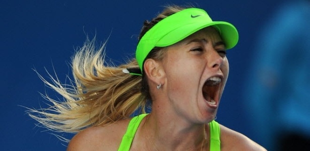 Maria Sharapova comemora vitória contra a tcheca Petra Kvitova  - AFP PHOTO / GREG WOOD
